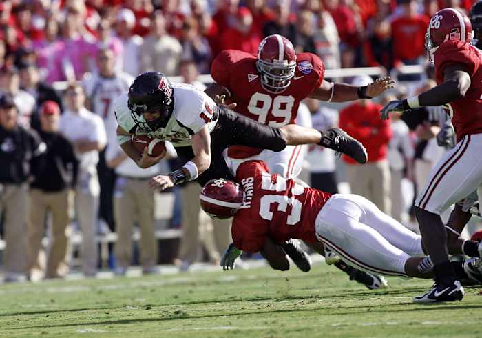 Alabama linebacker Demeco Ryans tackles a Texas Tech ballcarrier.